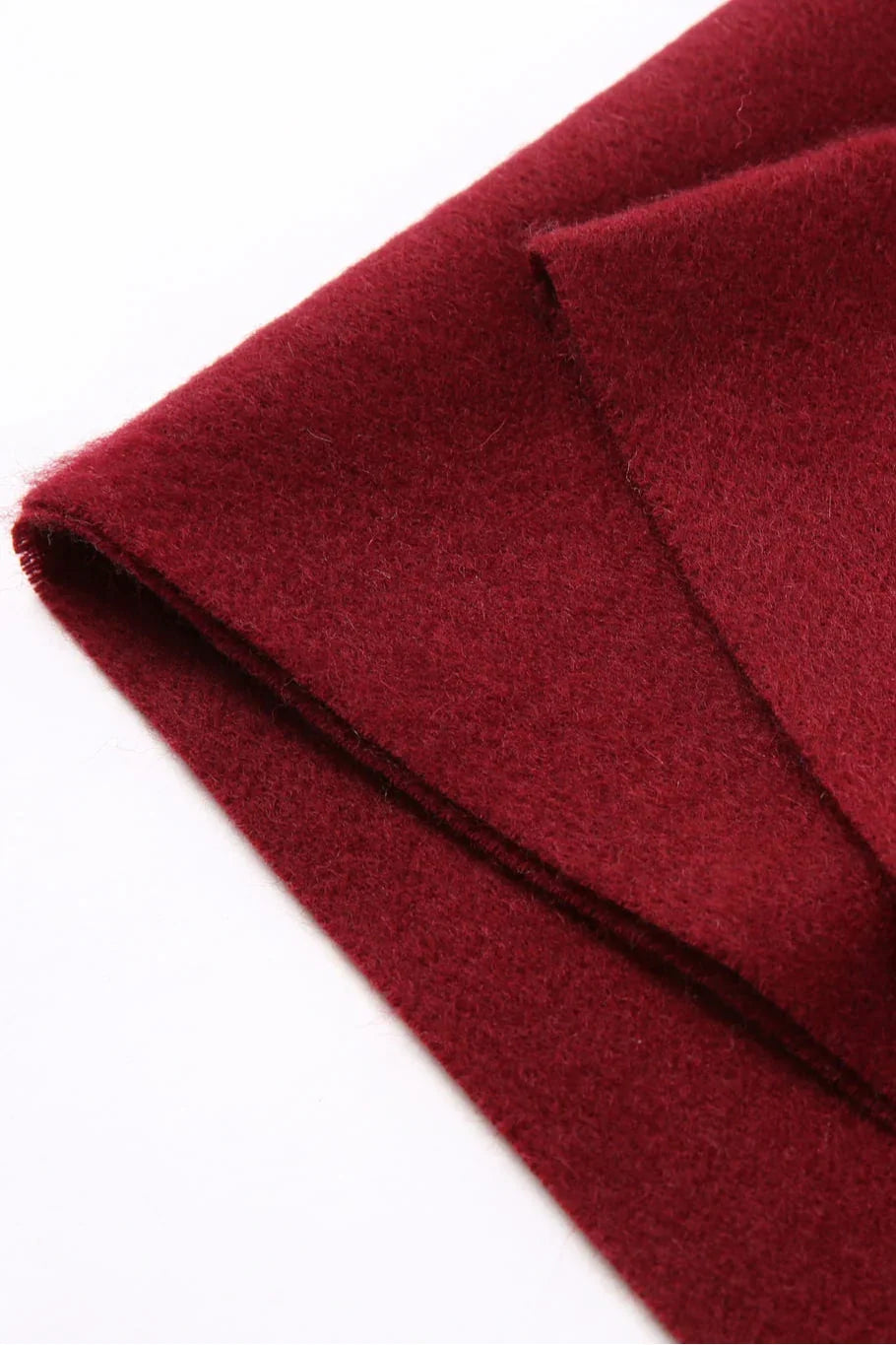 Fold edge detail of the Rhubarb burgundy merino