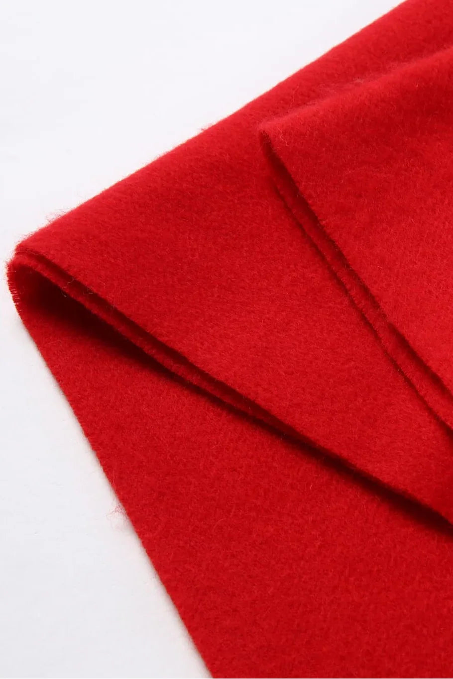 Fold edge detail of the Raving Red brushed merino