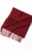 Rhubarb scarf folded flat with fringe