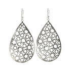 Silver wash teardrop earrings with a pierced jali star-and-honeycomb pattern