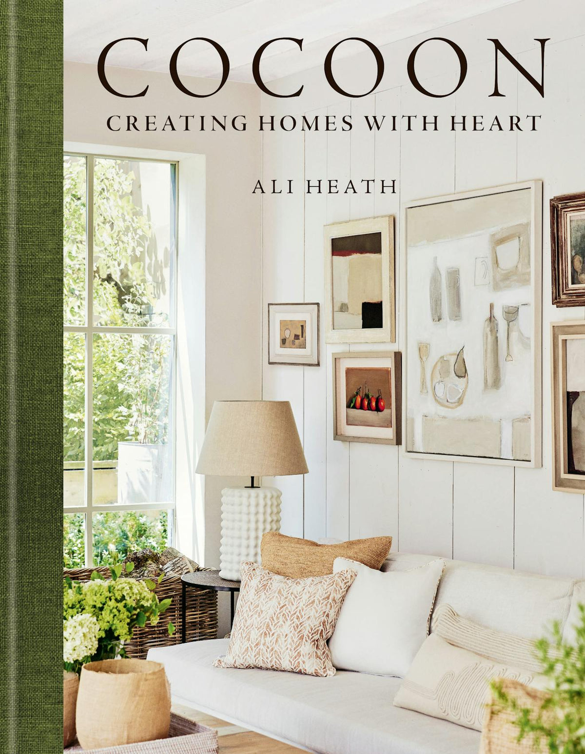 Cocoon by Ali Heath, the book's cover: a cream sitting room with framed prints and a green spine