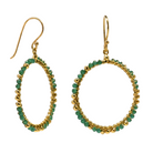 Gold hoop earrings wire-wrapped with emerald-green onyx beads, one hoop tilted