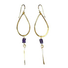 Gold teardrop hoop earrings with deep purple beads and a hammered blade drop