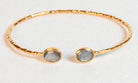 Euro Gold hammered cuff bangle with two grey moonstone-style gems