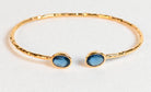 Euro Gold hammered cuff bangle with two London-blue oval gems