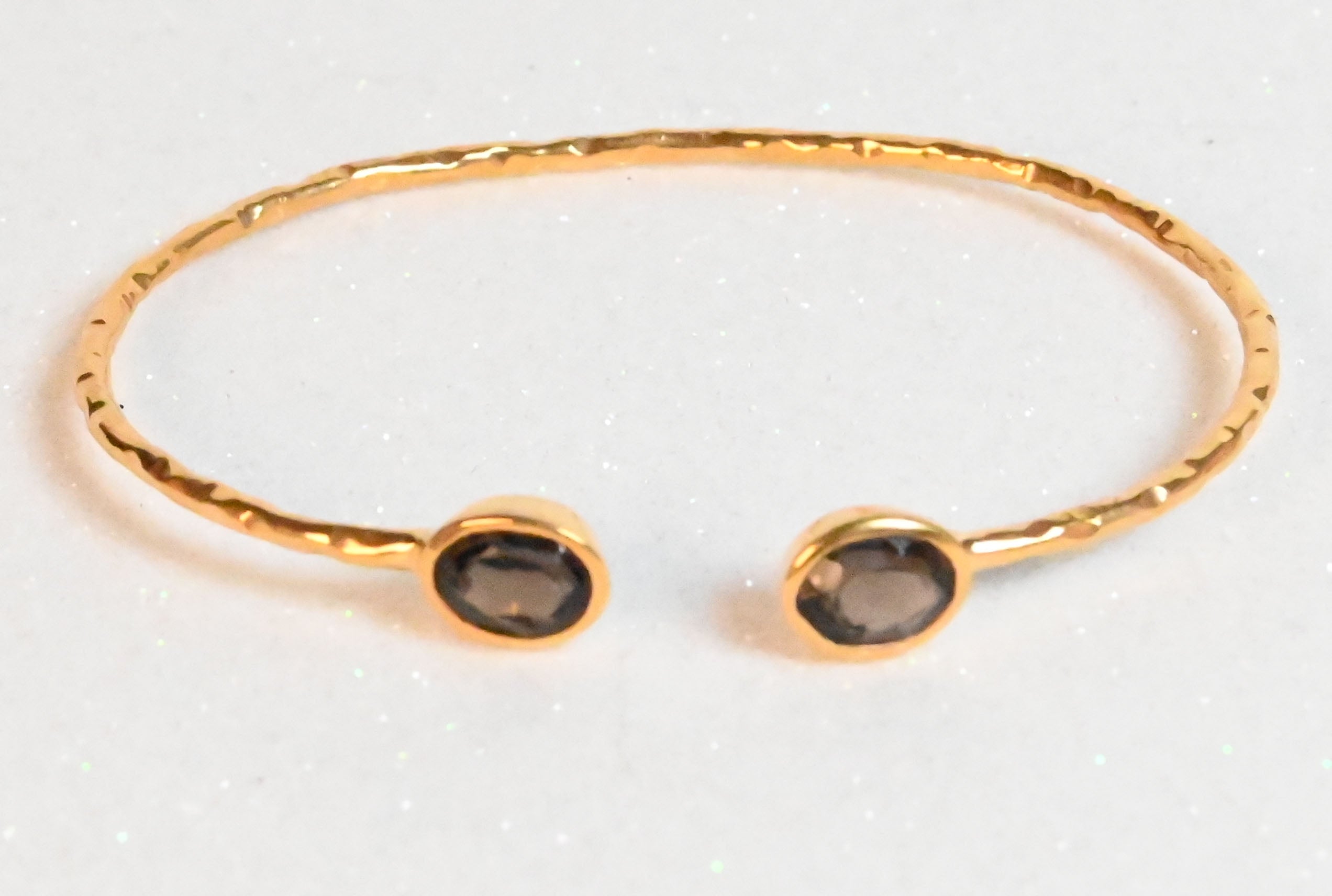 Euro Gold cuff bangle with two smoky quartz oval gems