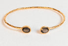 Euro Gold cuff bangle with two smoky quartz oval gems