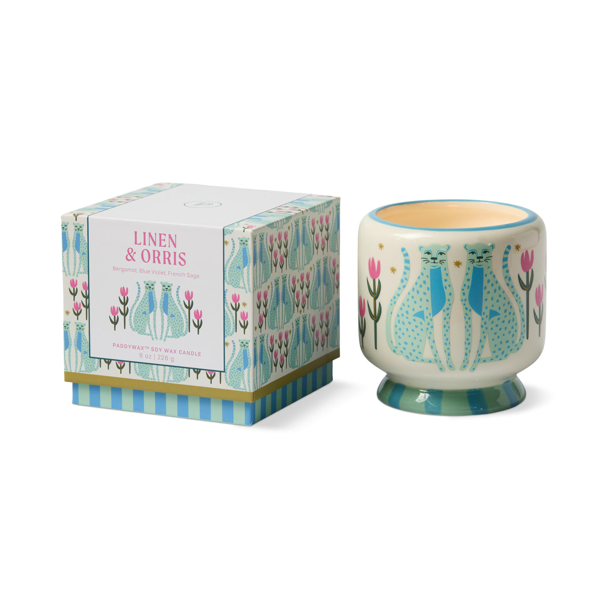 Cream ceramic candle painted with two pale blue spotted cheetahs and pink tulips, beside its matching Linen & Orris gift box.