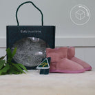 Orchid pink Platinum Baby Bootie displayed in its EMU Australia gift box with Australian Made swing tag