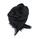 Beauty in Bamboo scarf in Black, loosely knotted to show its fine fringed ends
