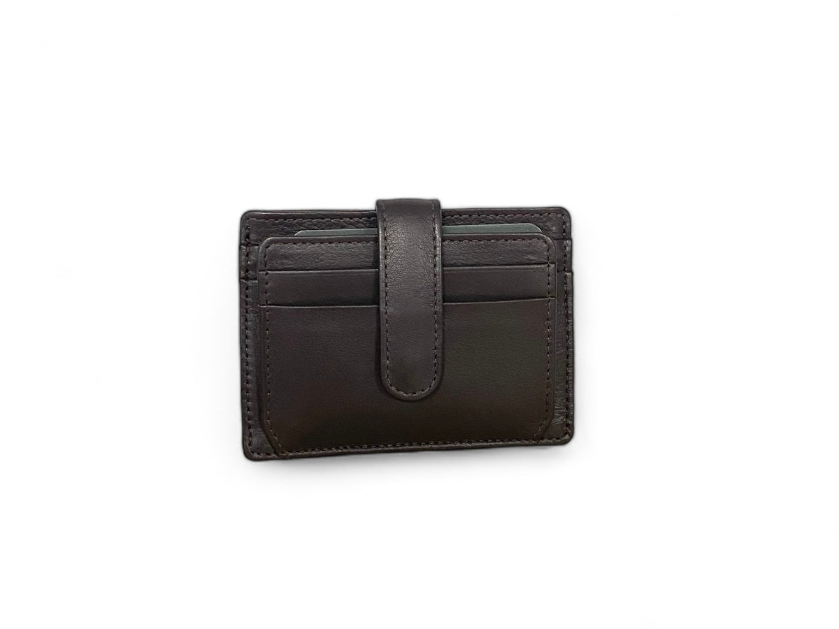 Brown card holder with its leather clip tab running across the stacked card slots