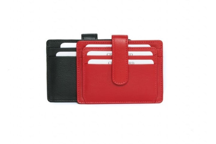 Black and red card holders side by side, cards tucked into the tiered slots of the red one
