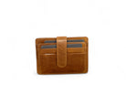 Brandy card holder in distressed leather, clip tab across the card slots