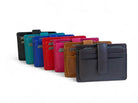 Leather card holders standing in a fanned row in black, aqua, cobalt, red, pink and brandy, a charcoal one at the front