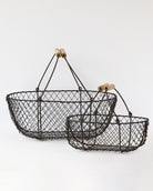Large and small French potager wire baskets nested together, showing the wooden-grip handles