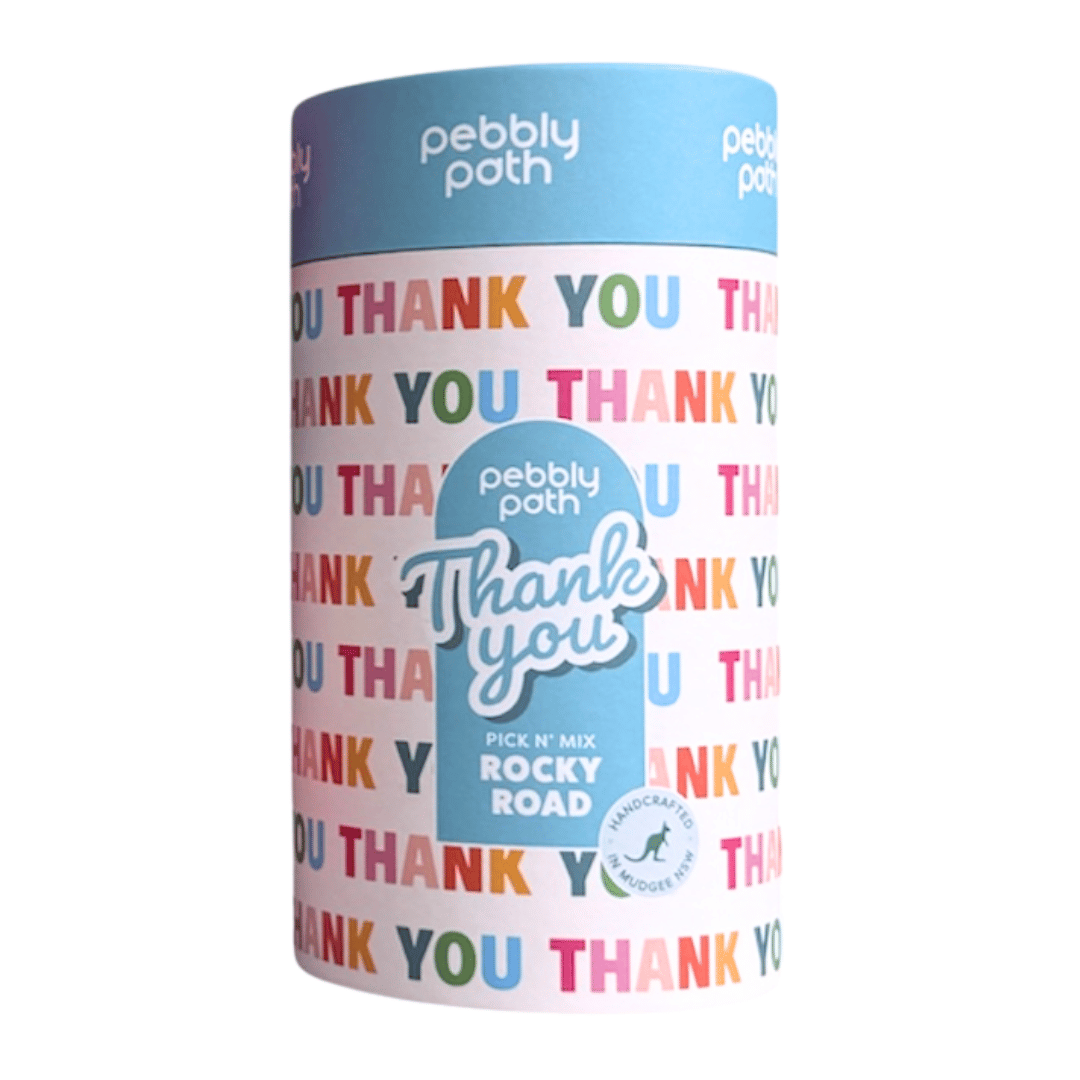 Pebbly Path Thank You rocky road gift cylinder with a blue lid and a rainbow Thank You print