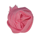 Beauty in Bamboo scarf in Candyfloss, a candy pink, rolled into a soft rosette