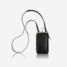 Jekyll & Hide black leather phone pouch hanging from its slim crossbody strap