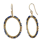 Gold hoop earrings wire-wrapped with deep blue lapis beads