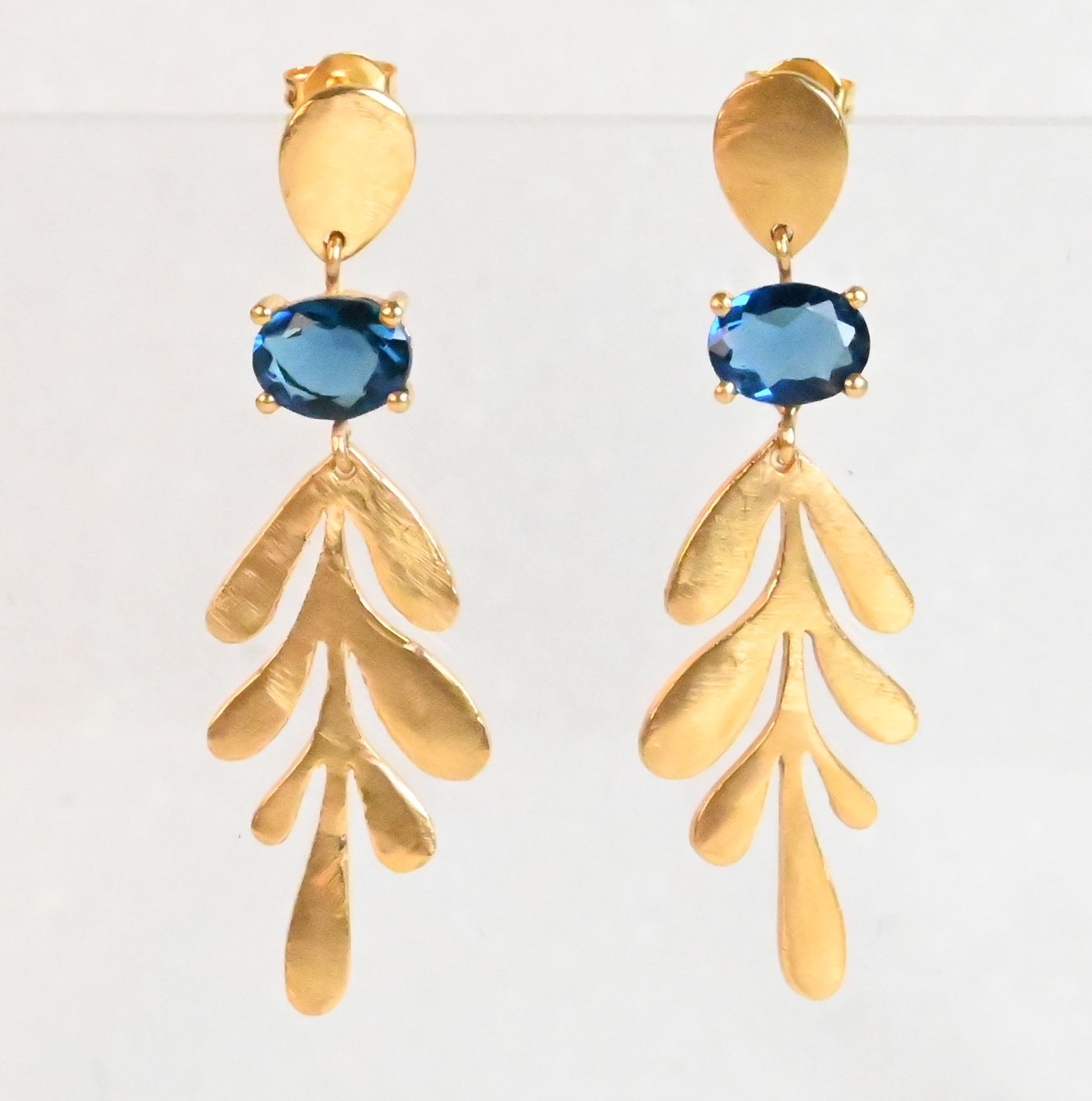 Euro Gold leaf drop earrings with London-blue oval gems and stud tops