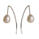White pearls on long, curved silver-tone hook earrings