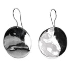 Round polished silver disc earrings with a rippled surface, on hooks