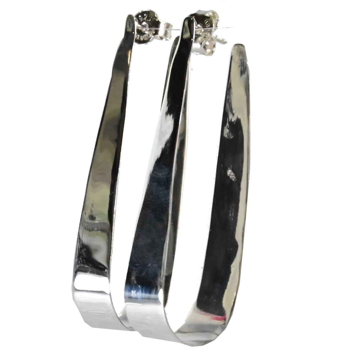 Polished silver ribbon hoop earrings overlapping, turned to show their curve