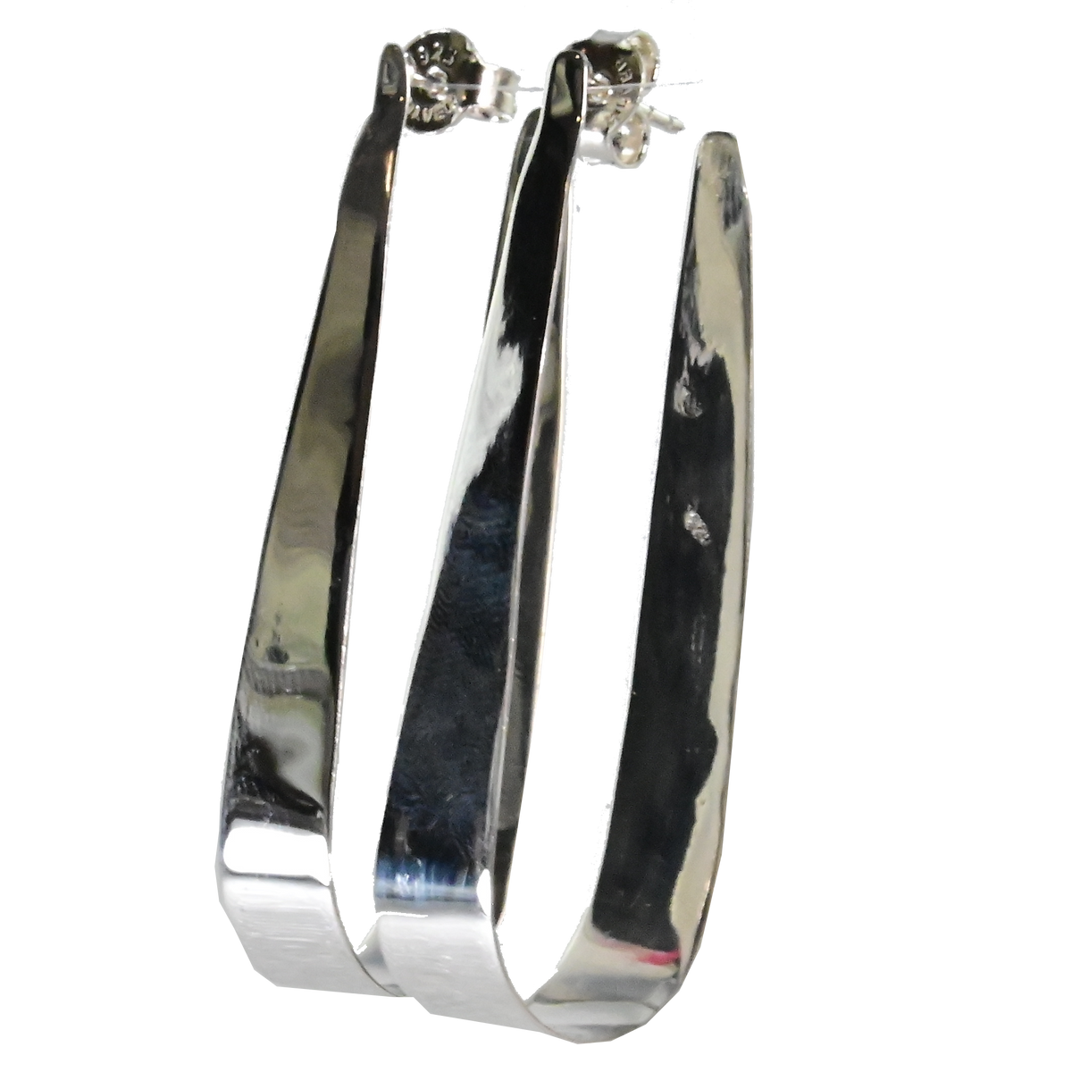 Polished silver ribbon hoop earrings overlapping, turned to show their curve