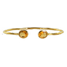 Hammered Euro Gold cuff bangle with two round citrine-yellow gems