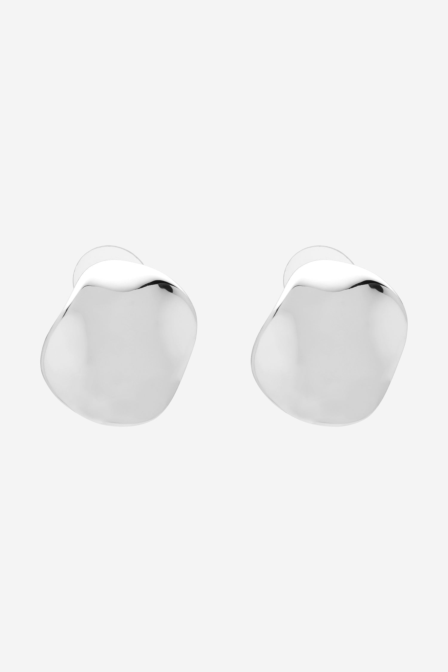 Silver earrings in an irregular, organic polished shape.
