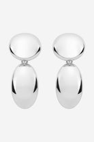 Silver statement drop earrings, two rounded discs with a mirror-like finish.