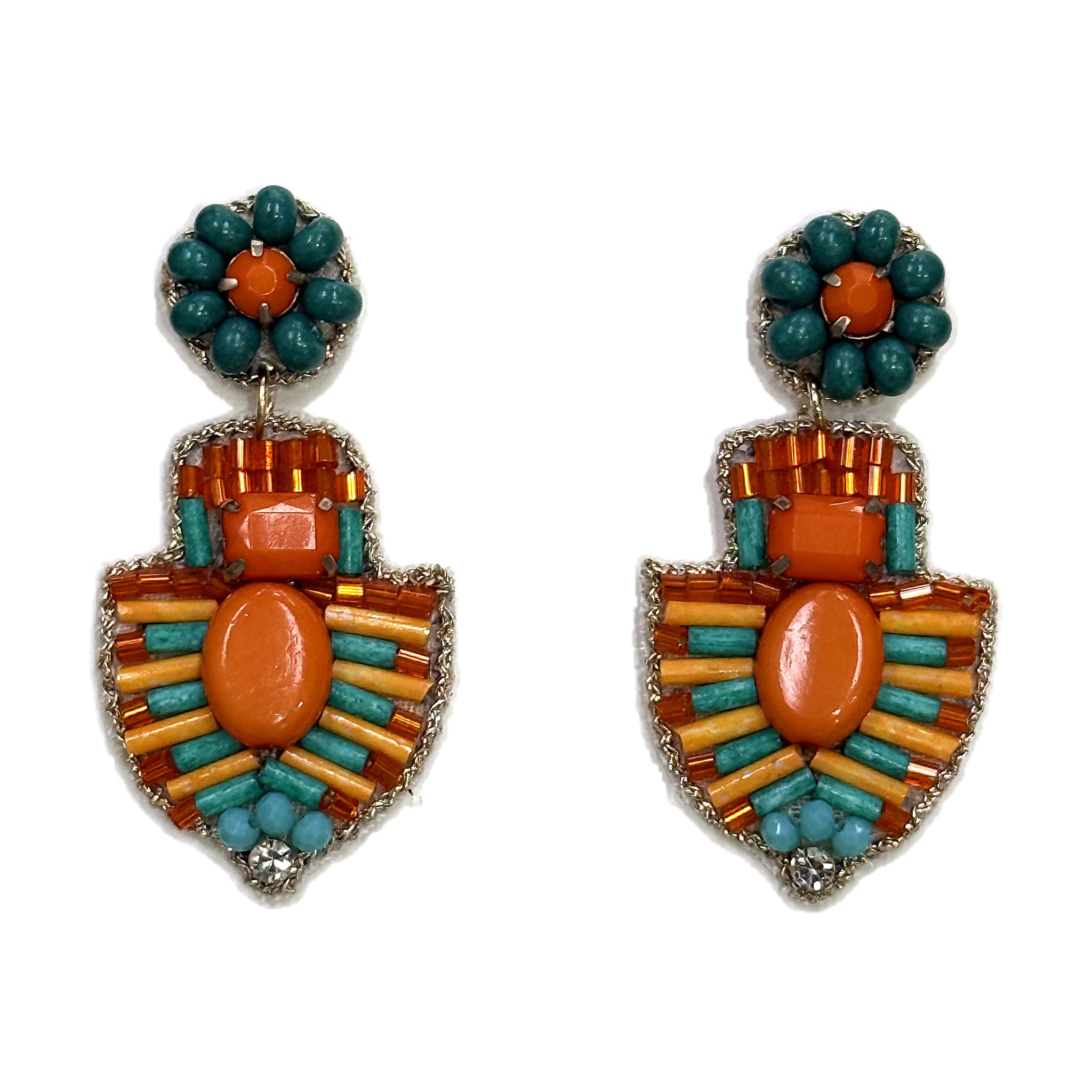 A pair of beaded drop earrings. Each has a round stud of teal beads around an orange centre stone, hanging to a shield-shaped drop of orange, mustard and turquoise bugle beads set around a large oval orange cabochon, edged in gold thread with a clear crystal at the lower point.