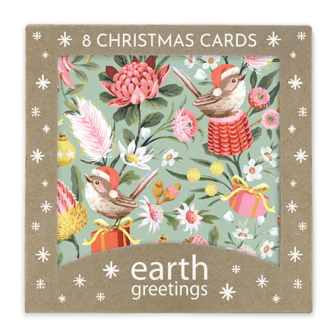 Kraft gift box of eight Christmas cards, its die-cut window showing a soft sage card patterned with small brown wrens, pink waratah, red banksia, white flannel flowers and baubles.