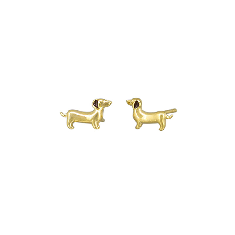 Pair of gold dachshund stud earrings with black enamel eyes on a white background