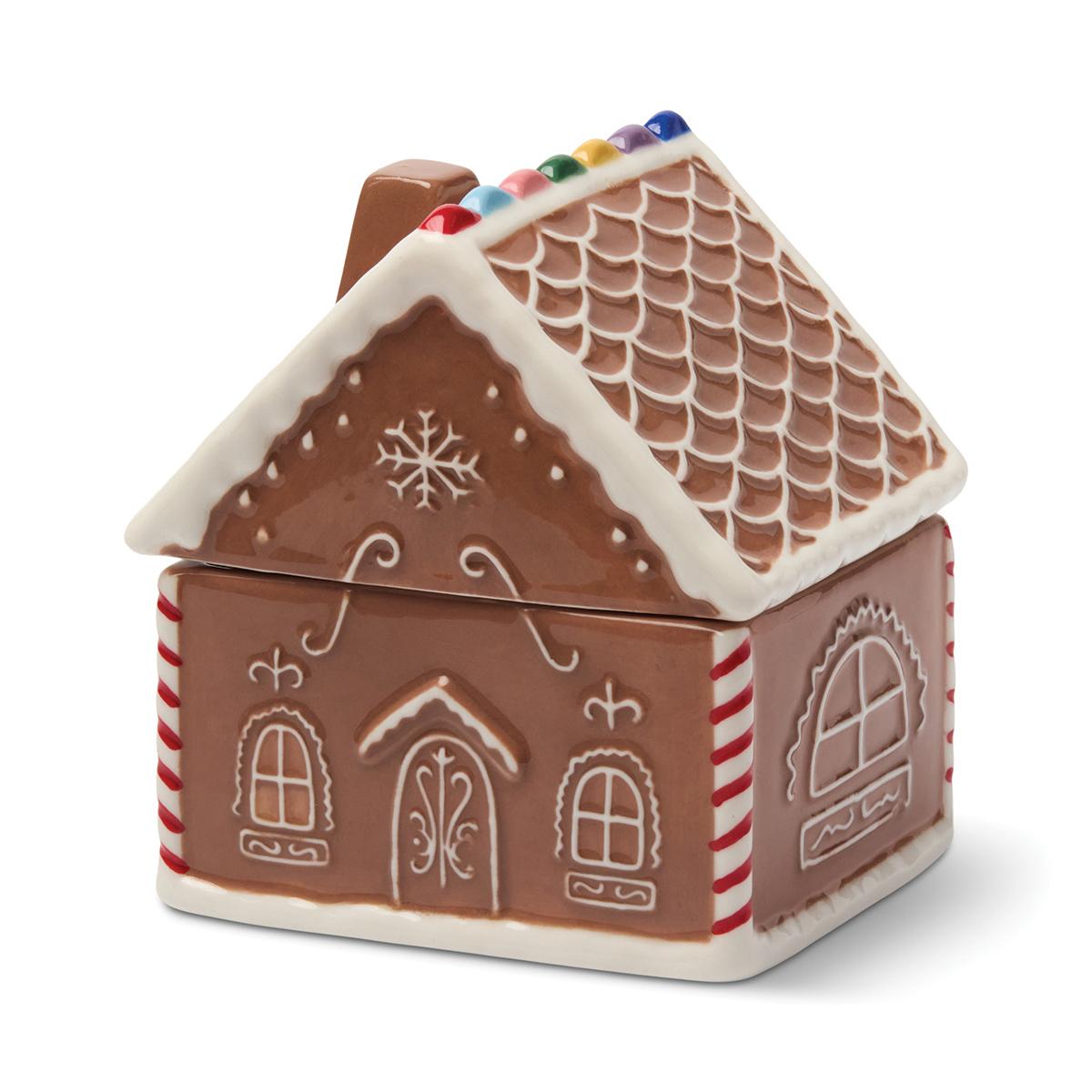 The gingerbread house from the other side, a snowflake on the gable and the chimney behind the ridge.