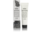 Salus Geranium & Bergamot Hand & Cuticle Cream tube beside its eucalyptus leaf gift box