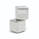 Close view of two polished silver chilling cubes stacked