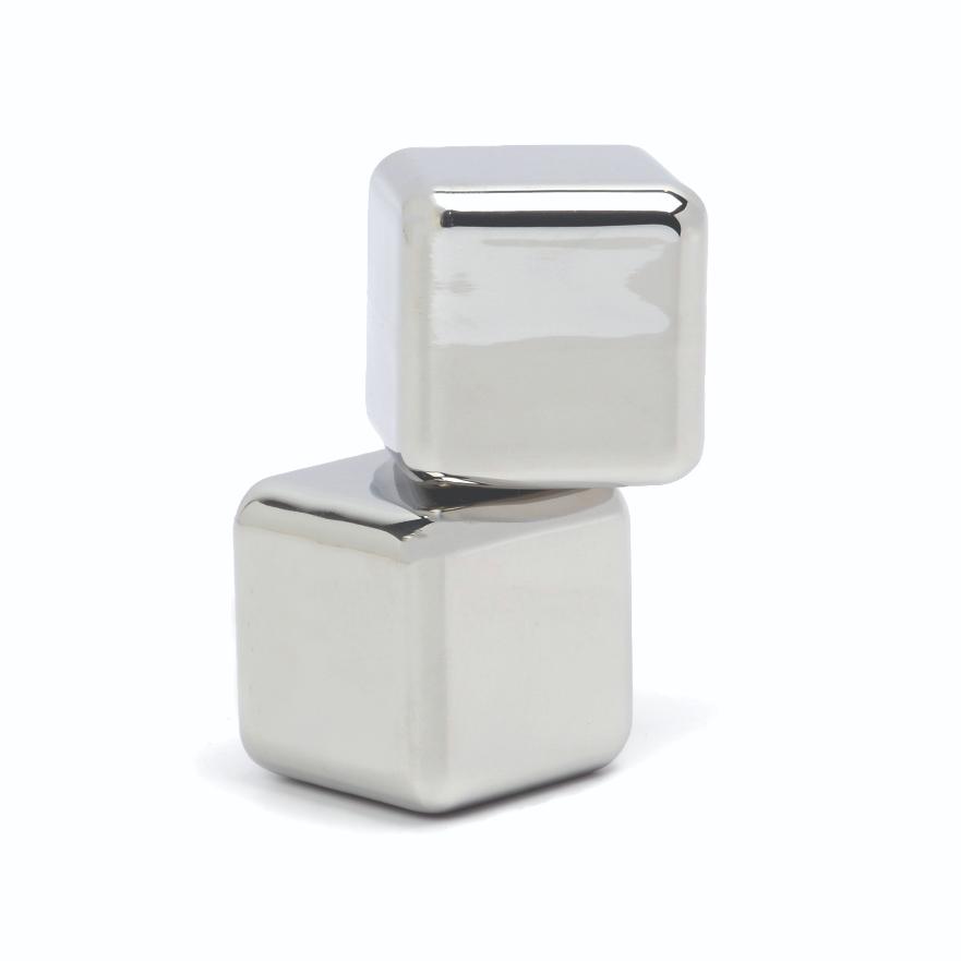 Close view of two polished silver chilling cubes stacked