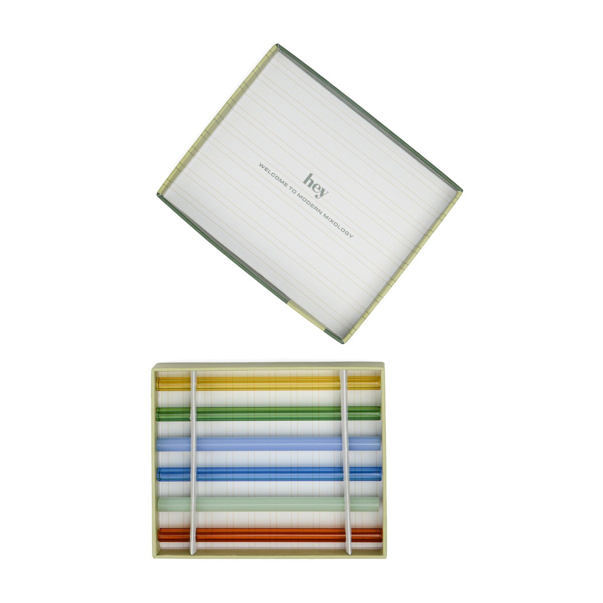 Top-down view of the open box, the straws lying in a divided tray with the lid set above.