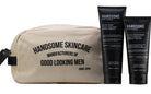 Handsome Essentials Set: printed canvas wash bag beside facial wash and daily moisturiser black tubes