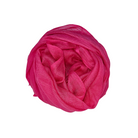 Beauty in Bamboo scarf in Hot Pink, a vivid magenta, swirled into a round coil