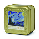 Gold-toned embossed square tin candle printed with Van Gogh's The Starry Night, labelled Midnight Cedre soy wax candle, 3.5 oz.