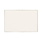 The journal open to its lined ivory pages