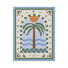 Front cover of the palm journal at a slight angle, showing the blue cloth spine
