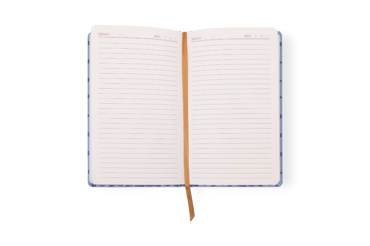 The journal open to lined pages with a subject and date line