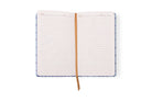 The journal open to lined pages with a subject and date line