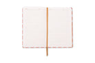 The journal open to lined pages with a subject and date line