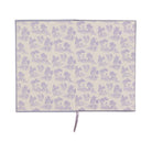 Lilac and white toile endpapers inside the cover