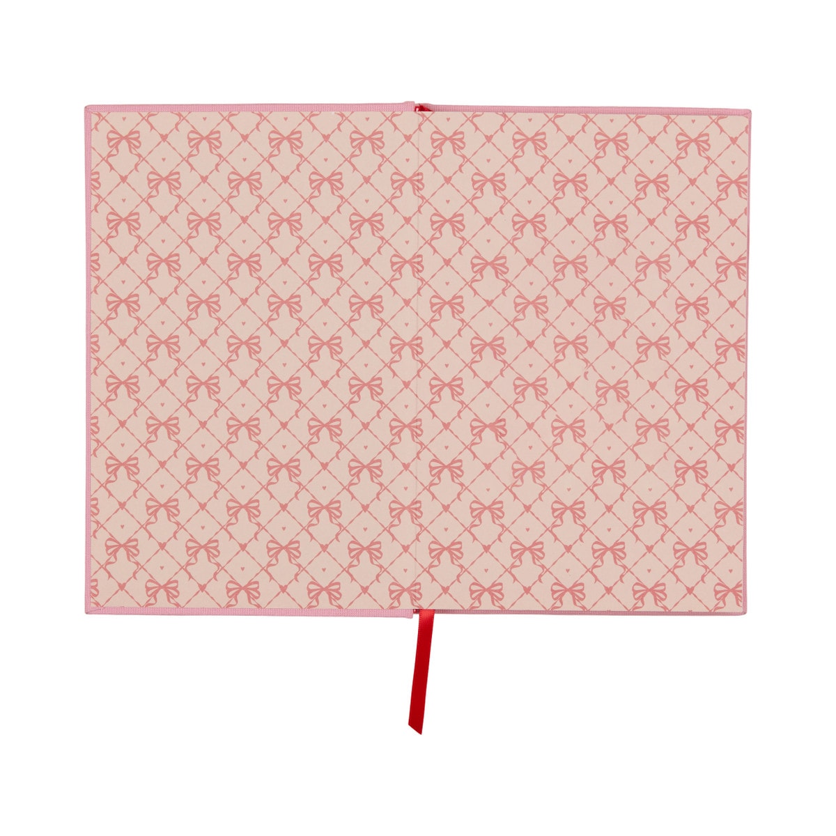 Matching pink and red bow-print endpapers inside the cover