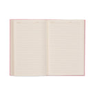The journal open to its lined ivory pages
